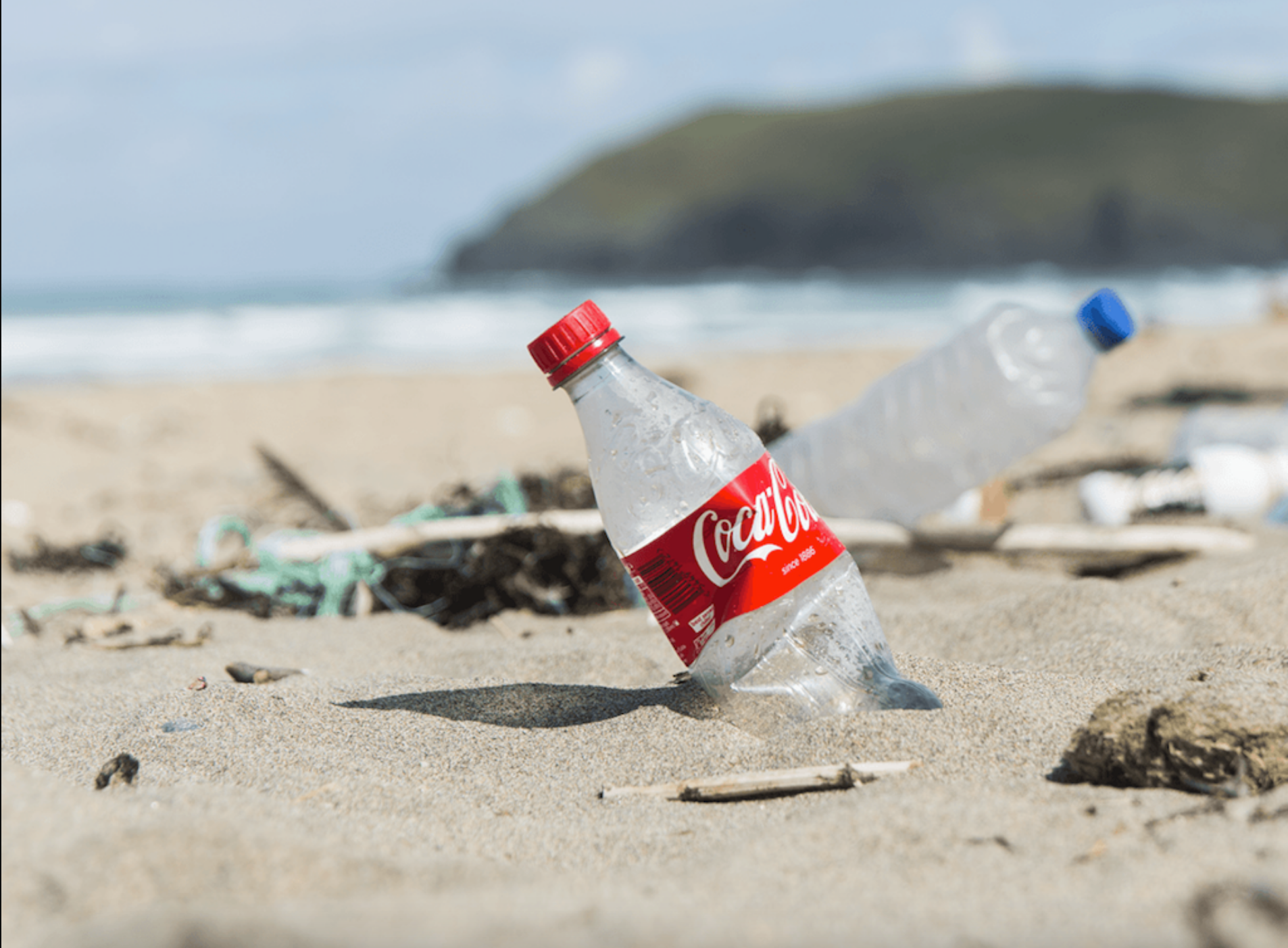 Coke bottle on beach