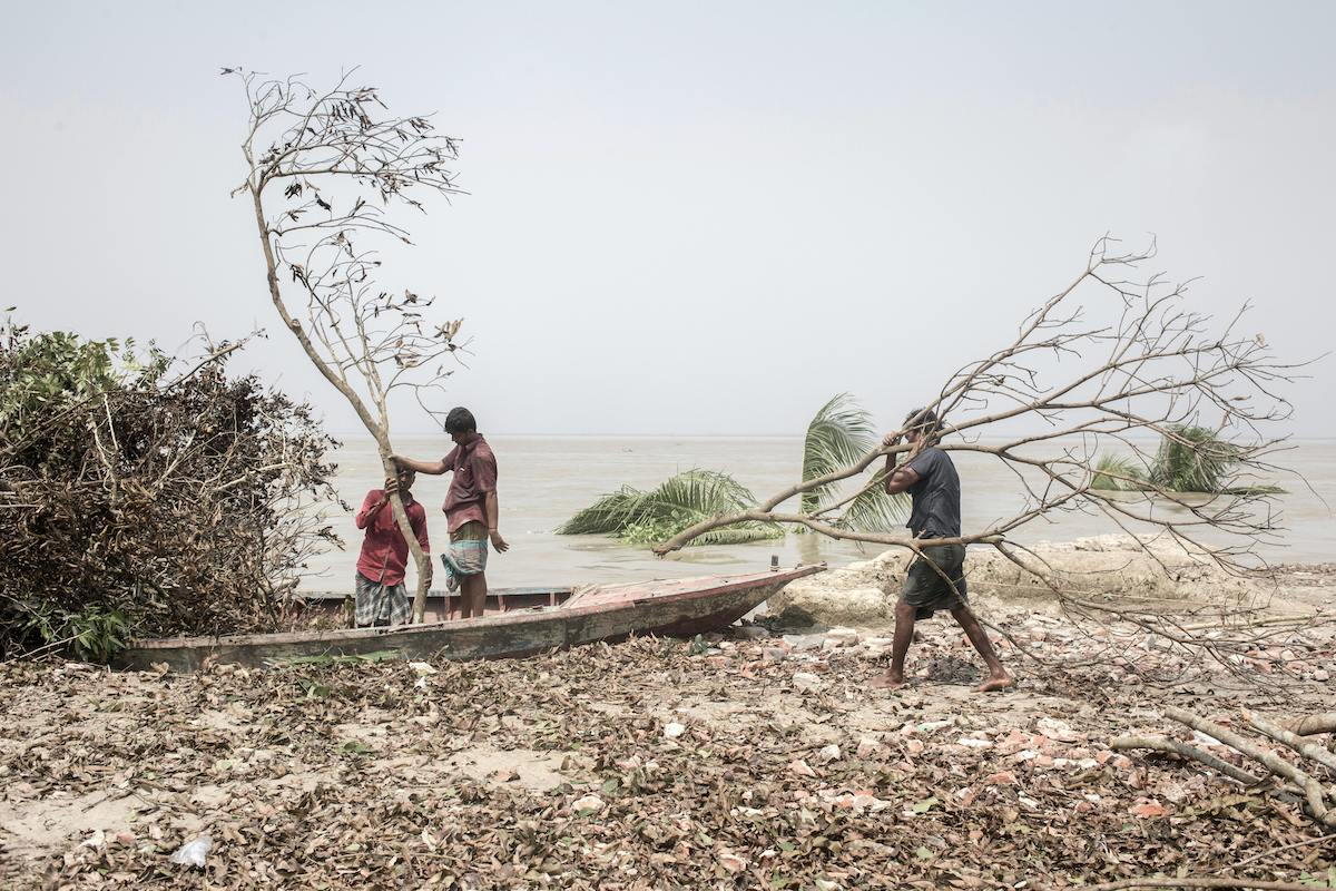 pexels-sohan-rahat-1445529889-27001157 2 People cleaning beach after storm